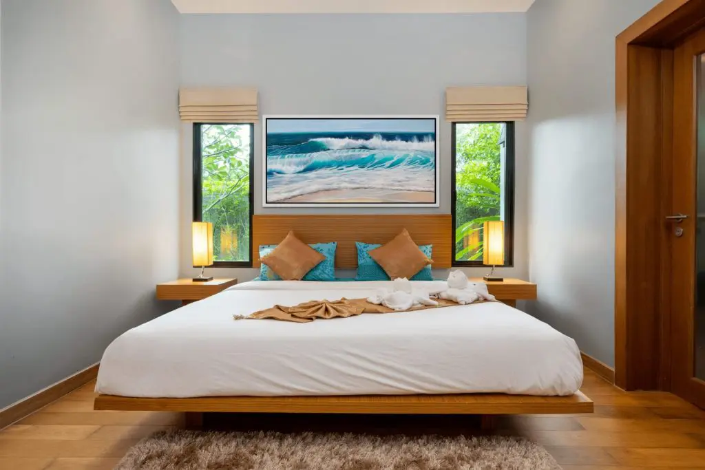 Turquoise Surf painting in a bedroom setting