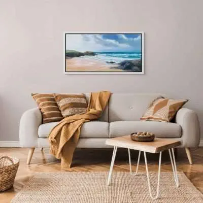 Treyarnon Beach painting in a white floating frame in a room setting